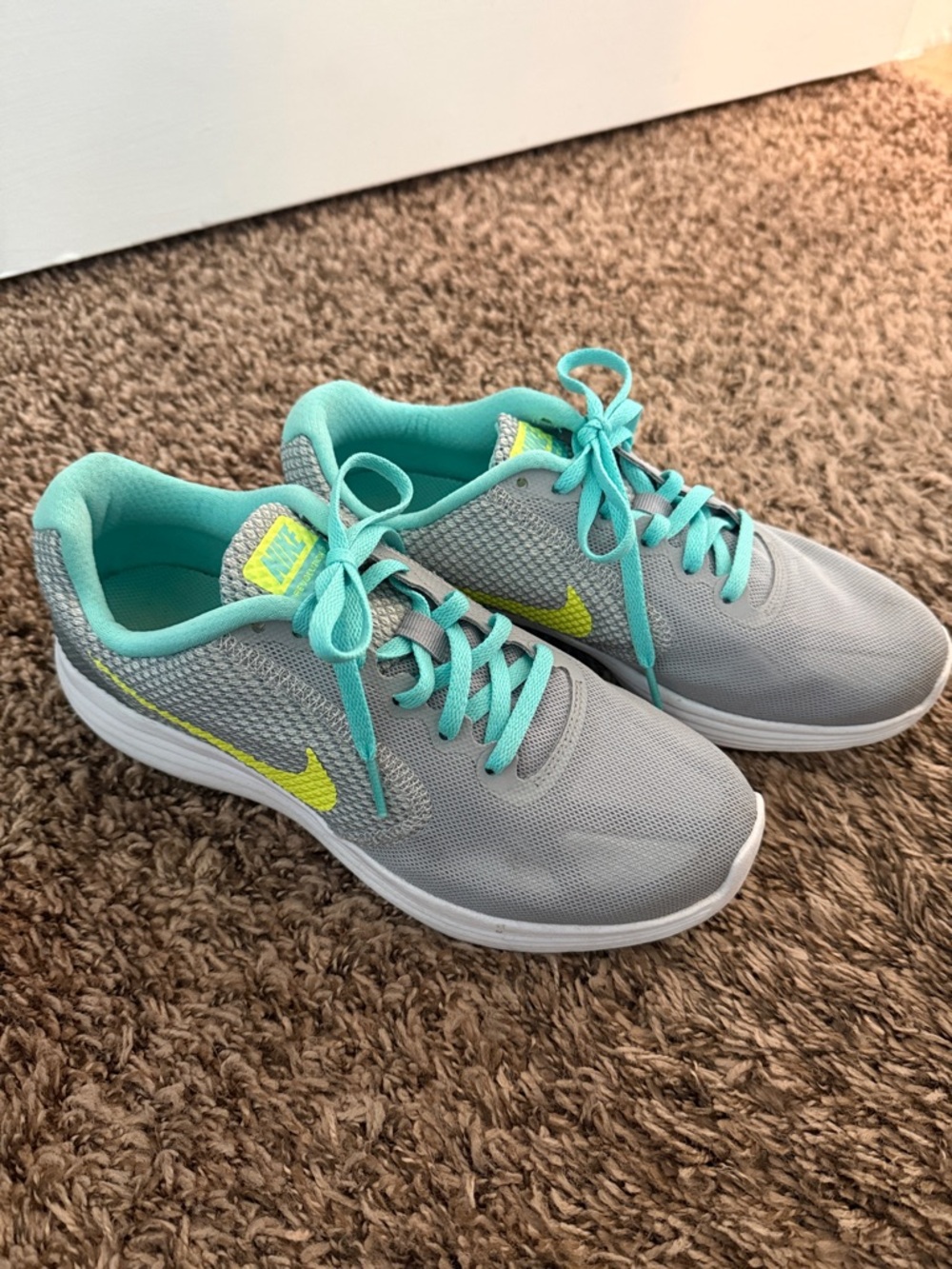 Nike Women's Gray Teal Athletic Sneakers with Yellow Swoosh